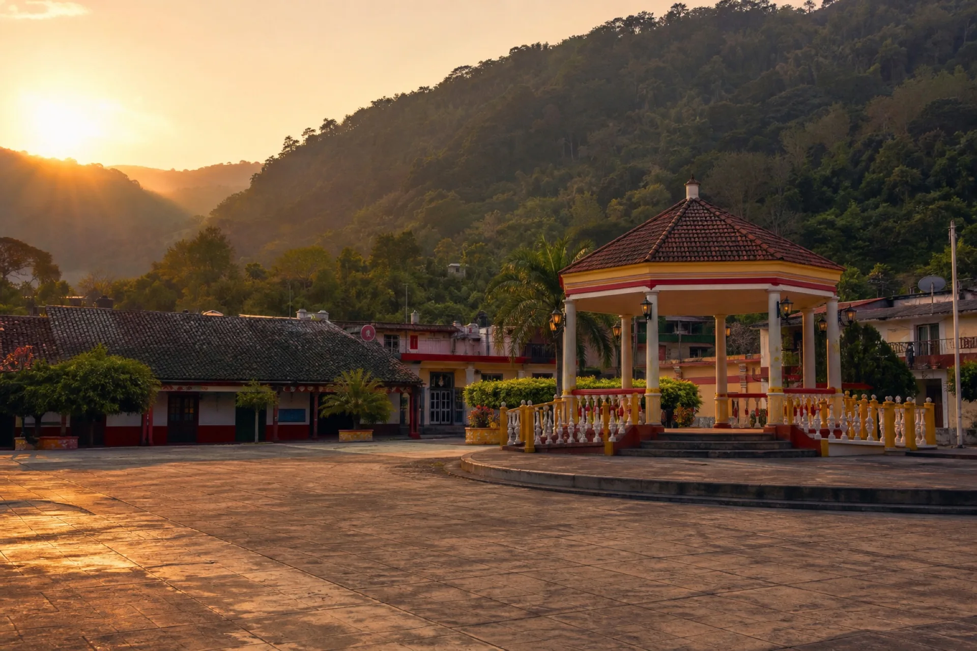Plaza principal de Coxquihui con kiosco y casas bajas.